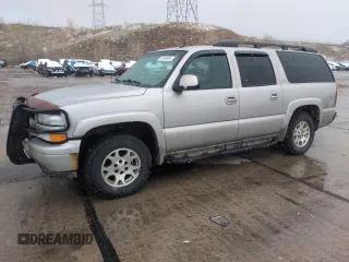 2004 Chevrolet Suburban Z71 z VIN 3GNFK16Z44G305168, wystawiony jako Copart lot #53900955 z przebiegiem 186 770 mil mil oraz Szkoda całkowita • Salvage title. Historia ofert i sprzedaży dostępna na DreamBid. Obrazek 1.