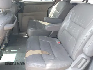 2003 Honda Odyssey EX-L with VIN 5FNRL18003B042487, listed as a IAAI auction lot 42604399 with 188,126 mi miles and . Bid and sale history available at DreamBid. Image 8.