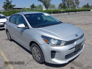 2018 Kia Rio LX with VIN 3KPA24AB4JE086105, listed as a IAAI auction lot 42062323 with 128,289 mi miles. Bid and sale history available at carsss.com. Image 1.