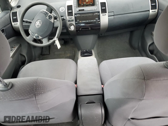 2007 Toyota Prius z VIN JTDKB20U373262928, wystawiony jako Copart lot #49355495 z przebiegiem 142 289 mil mil oraz Szkoda całkowita • Salvage title. Historia ofert i sprzedaży dostępna na DreamBid. Obrazek 8.