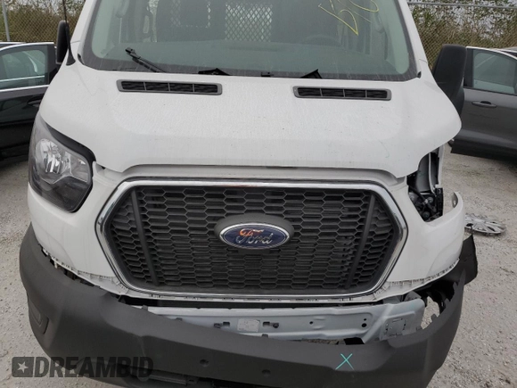 2024 Ford Transit Cargo with VIN 1FTBR1Y88RKA33408, listed as a Copart auction lot 75762044 with Not Provided miles and Clean Title. Bid and sale history available at DreamBid. Image 12.