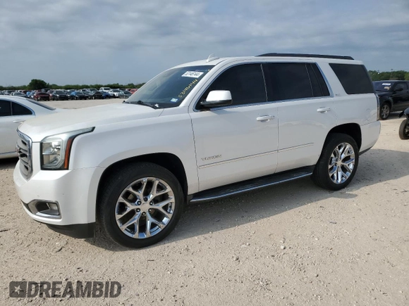 2016 GMC Yukon SLT with VIN 1GKS1BKC2GR248172, listed as a Copart auction lot 53146144 with 125,968 mi miles and Salvage Title. Bid and sale history available at carsss.com. Image 1.