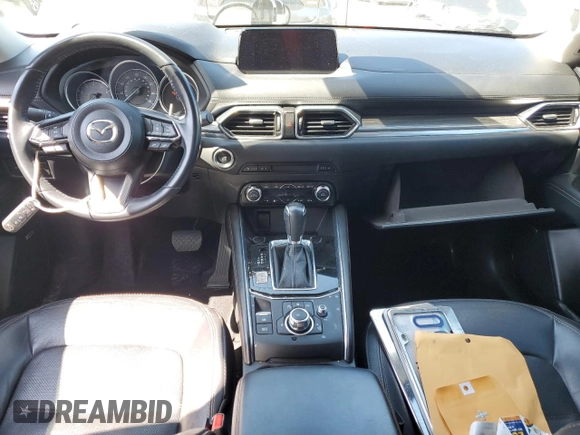 2018 Mazda CX-5 Grand Touring with VIN JM3KFBDM5J0373351, listed as a Copart auction lot 59395945 with Not provided miles and Salvage title. Bid and sale history available at DreamBid. Image 8.
