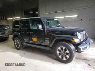 2022 Jeep Wrangler Unlimited Sahara Altitude with VIN 1C4HJXEG0NW115877, listed as a Copart auction lot 80689494 with 30,928 mi miles and Salvage title. Bid and sale history available at DreamBid. Image 4.
