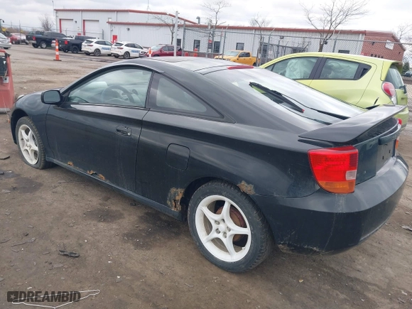 2000 Toyota Celica GT with VIN JTDDR32T7Y0006809, listed as a IAAI auction lot 41860933 with 262,014 mi miles. Bid and sale history available at carsss.com. Image 3.