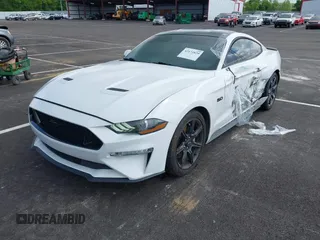 2019 Ford Mustang GT z VIN 1FA6P8CF6K5173649, wystawiony jako IAAI lot #42172829 z przebiegiem 85 346 mil mil oraz . Historia ofert i sprzedaży dostępna na DreamBid. Obrazek 2.