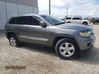 2012 Jeep Grand Cherokee Laredo with VIN 1C4RJEAG3CC182616, listed as a Copart auction lot 63087294 with 0 mi miles and Clean Title. Bid and sale history available at carsss.com. Image 4.