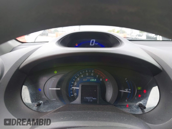 2012 Honda Insight LX with VIN JHMZE2H51CS002447, listed as a IAAI auction lot 42353583 with 179,377 mi miles and . Bid and sale history available at DreamBid. Image 7.