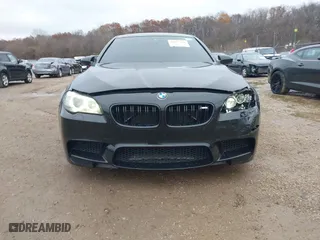 2013 BMW M5 with VIN WBSFV9C51DD095750, listed as a IAAI auction lot 40907304 with 93,014 mi miles. Bid and sale history available at carsss.com. Image 12.