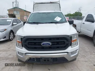 2021 Ford F-150 XL with VIN 1FTMF1CB7MKE81507, listed as a IAAI auction lot 41903595 with 71,860 mi miles and . Bid and sale history available at DreamBid. Image 12.