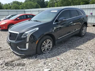 2020 Cadillac XT5 Premium Luxury FWD with VIN 1GYKNCRSXLZ124030, listed as a Copart auction lot 58699115 with 86,668 mi miles and Salvage title. Bid and sale history available at DreamBid. Image 1.