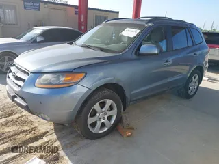 2009 Hyundai Santa Fe SE with VIN 5NMSH73EX9H318027, listed as a IAAI auction lot 42668676 with 185,610 mi miles and . Bid and sale history available at DreamBid. Image 2.