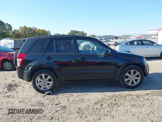 2011 Suzuki Grand Vitara Limited z VIN JS3TE0D72B4100152, wystawiony jako IAAI lot #40676416 z przebiegiem 193 097 mil mil oraz . Historia ofert i sprzedaży dostępna na DreamBid. Obrazek 13.