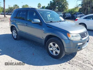 2006 Suzuki Grand Vitara Premium z VIN JS3TD943064100693, wystawiony jako IAAI lot #41772479 z przebiegiem 135 901 mil mil oraz . Historia ofert i sprzedaży dostępna na DreamBid. Obrazek 1.