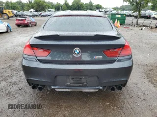 2015 BMW M6 z VIN WBS6C9C59FD467943, wystawiony jako Copart lot #63477904 z przebiegiem 80 186 mil mil oraz Szkody całkowita. Historia ofert i sprzedaży dostępna na DreamBid. Obrazek 6.