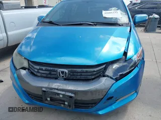 2010 Honda Insight EX with VIN JHMZE2H71AS003290, listed as a IAAI auction lot 42601332 with 163,510 mi miles and . Bid and sale history available at DreamBid. Image 6.