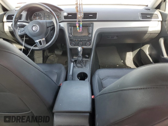 2015 Volkswagen Passat Wolfsburg Edition with VIN 1VWAS7A36FC110135, listed as a Copart auction lot 61097945 with 111,284 mi miles and Salvage title. Bid and sale history available at DreamBid. Image 8.