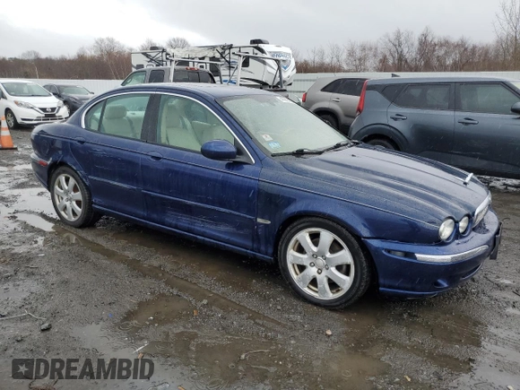 2004 Jaguar X-Type with VIN SAJEA51C74WE00833, listed as a Copart auction lot 49952155 with 109,254 mi miles and Non Repairable. Bid and sale history available at DreamBid. Image 4.