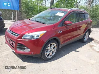 2015 Ford Escape Titanium with VIN 1FMCU0J92FUA38616, listed as a IAAI auction lot 42136816 with 131,941 mi miles and . Bid and sale history available at DreamBid. Image 2.