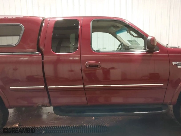 1998 Ford F-150 Standard with VIN 1FTZX18W8WKA19037, listed as a IAAI auction lot 40977819 with 137,119 mi miles. Bid and sale history available at carsss.com. Image 13.