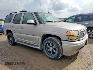 2004 GMC Yukon Denali z VIN 1GKEK63U84J298285, wystawiony jako Copart lot #59865815 z przebiegiem 168 414 mil mil oraz Czysty tytuł • Clean title. Historia ofert i sprzedaży dostępna na DreamBid. Obrazek 4.