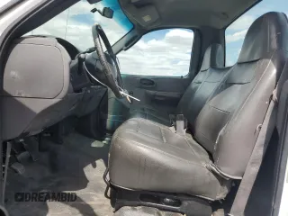 2004 Ford F-150 XL with VIN 2FTRF17294CA59985, listed as a Copart auction lot 55296195 with 220,933 mi miles and Salvage title. Bid and sale history available at DreamBid. Image 7.