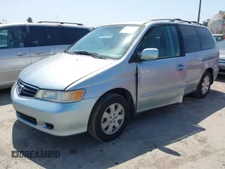 2003 Honda Odyssey EX with VIN 2HKRL18633H502246, listed as a IAAI auction lot 42414427 with 251,759 mi miles and . Bid and sale history available at DreamBid. Image 2.