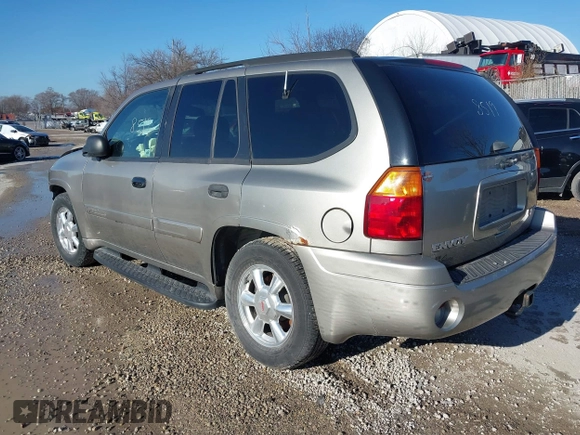 2003 GMC Envoy SLE with VIN 1GKDT13S732168534, listed as a IAAI auction lot 38049193 with 230,894 mi miles. Bid and sale history available at carsss.com. Image 3.