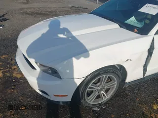 2012 Ford Mustang V6 with VIN 1ZVBP8EM0C5212707, listed as a IAAI auction lot 41775024 with 144,116 mi miles and . Bid and sale history available at carsss.com. Image 6.