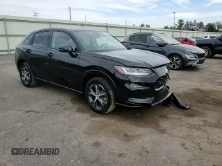 2025 Honda HR-V EX-L z VIN 3CZRZ2H73SM754322, wystawiony jako Copart lot #54138475 z przebiegiem 2 078 mil mil oraz Szkoda całkowita • Salvage title. Historia ofert i sprzedaży dostępna na DreamBid. Obrazek 13.