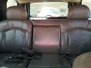 2002 Chevrolet Tahoe LS with VIN 1GNEK13Z52R156962, listed as a Copart auction lot 58169335 with 162,916 mi miles and Salvage title. Bid and sale history available at DreamBid. Image 10.