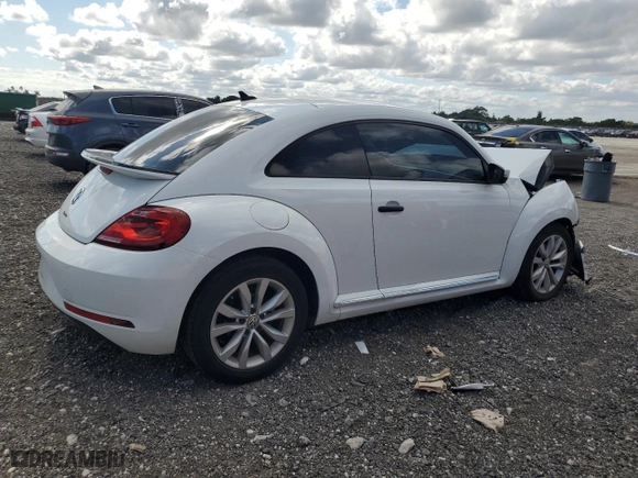 2017 Volkswagen Beetle 1.8T Fleet with VIN 3VWF17AT1HM617468, listed as a Copart auction lot 82233824 with 72,800 mi miles and Salvage Title. Bid and sale history available at carsss.com. Image 3.