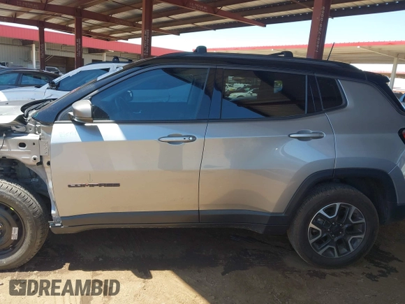 2019 Jeep Compass Trailhawk z VIN 3C4NJDDB1KT812953, wystawiony jako IAAI lot #42178451 z przebiegiem 76 269 mil mil oraz . Historia ofert i sprzedaży dostępna na DreamBid. Obrazek 14.