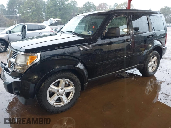 2007 Dodge Nitro SXT with VIN 1D8GT28K67W683600, listed as a IAAI auction lot 40958011 with 70,141 mi miles. Bid and sale history available at carsss.com. Image 17.