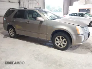 2008 Cadillac SRX RWD z VIN 1GYEE637580125536, wystawiony jako IAAI lot #42509294 z przebiegiem Nie podano mil oraz . Historia ofert i sprzedaży dostępna na DreamBid. Obrazek 1.