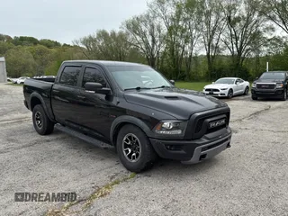 2016 Ram 1500 Rebel z VIN 1C6RR7YT2GS171455, wystawiony jako Copart lot #54708635 z przebiegiem 150 421 mil mil oraz Tytuł czysty. Historia ofert i sprzedaży dostępna na DreamBid. Obrazek 1.