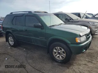 2002 Isuzu Rodeo S z VIN 4S2CK58W024333487, wystawiony jako Copart lot #76361854 z przebiegiem Nie podano mil oraz Nie do naprawy. Historia ofert i sprzedaży dostępna na DreamBid. Obrazek 4.