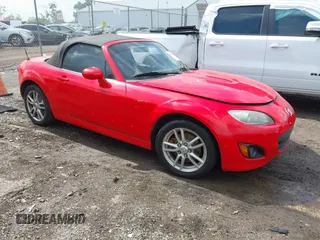 2010 Mazda MX-5 Miata Grand Touring with VIN JM1NC2EFXA0205333, listed as a IAAI auction lot 42378904 with 86,449 mi miles and . Bid and sale history available at DreamBid. Image 1.