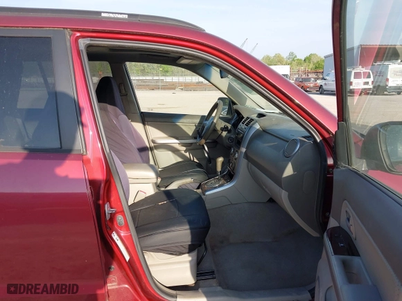 2006 Suzuki Grand Vitara Luxury with VIN JS3TD947564104838, listed as a IAAI auction lot 42082783 with 122,912 mi miles. Bid and sale history available at carsss.com. Image 5.