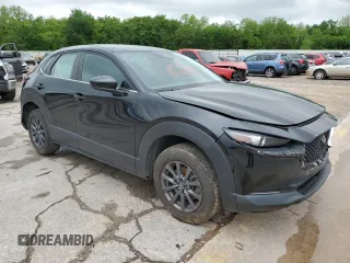 2021 Mazda CX-30 S with VIN 3MVDMAAL5MM303863, listed as a Copart auction lot 54946935 with 71,968 mi miles and Salvage title. Bid and sale history available at DreamBid. Image 4.