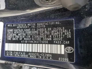 2019 Toyota Camry LE with VIN 4T1B11HK3KU774056, listed as a Copart auction lot 51497175 with 129,690 mi miles and Salvage Title. Bid and sale history available at carsss.com. Image 12.