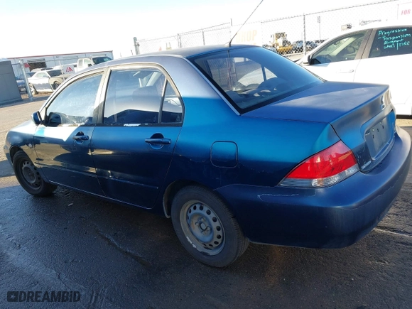 2005 Mitsubishi Lancer ES with VIN JA3AJ26E65U014838, listed as a IAAI auction lot 41310586 with 127,487 mi miles. Bid and sale history available at carsss.com. Image 14.