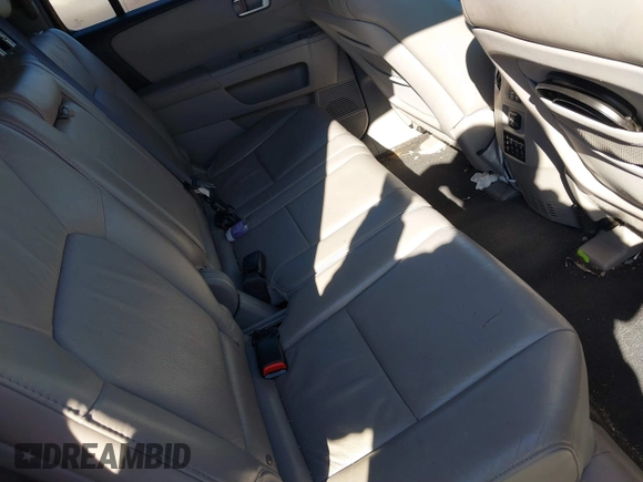 2011 Honda Pilot EX-L with VIN 5FNYF4H65BB004213, listed as a IAAI auction lot 41867681 with 157,644 mi miles and . Bid and sale history available at carsss.com. Image 8.