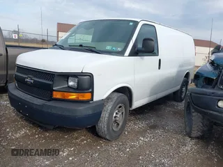 2014 Chevrolet Express Cargo Van with VIN 1GCWGFCA2E1148147, listed as a IAAI auction lot 41101132 with 110,648 mi miles. Bid and sale history available at carsss.com. Image 2.