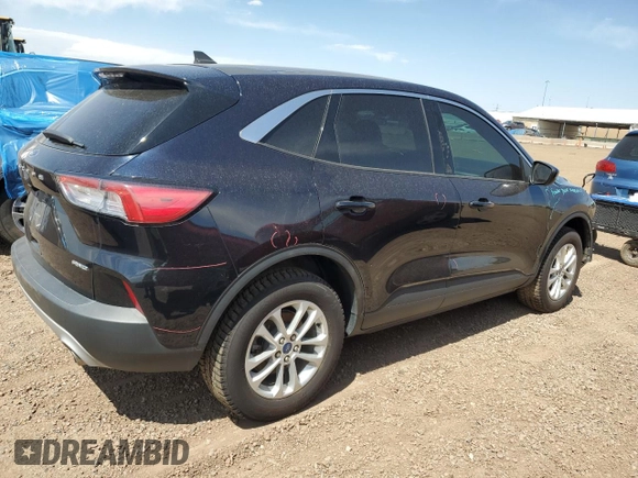 2021 Ford Escape SE with VIN 1FMCU9G66MUA94797, listed as a Copart auction lot 60864235 with 64,712 mi miles and Salvage title. Bid and sale history available at DreamBid. Image 3.