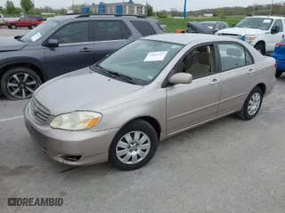 2003 Toyota Corolla CE with VIN 1NXBR32E73Z137535, listed as a IAAI auction lot 42041727 with 243,586 mi miles. Bid and sale history available at carsss.com. Image 2.