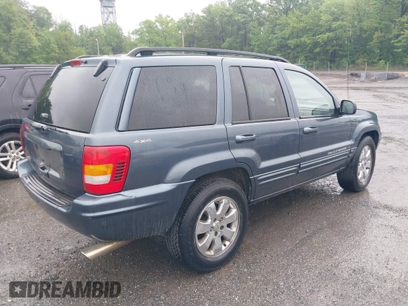2001 Jeep Grand Cherokee Limited with VIN 1J4GW58S21C673916, listed as a IAAI auction lot 42127522 with Not Provided miles and . Bid and sale history available at DreamBid. Image 4.