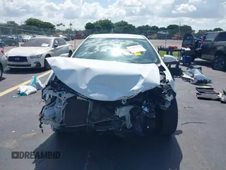 2016 Toyota Corolla L z VIN 2T1BURHE2GC575265, wystawiony jako IAAI lot #42438427 z przebiegiem 163 860 mil mil oraz . Historia ofert i sprzedaży dostępna na DreamBid. Obrazek 6.