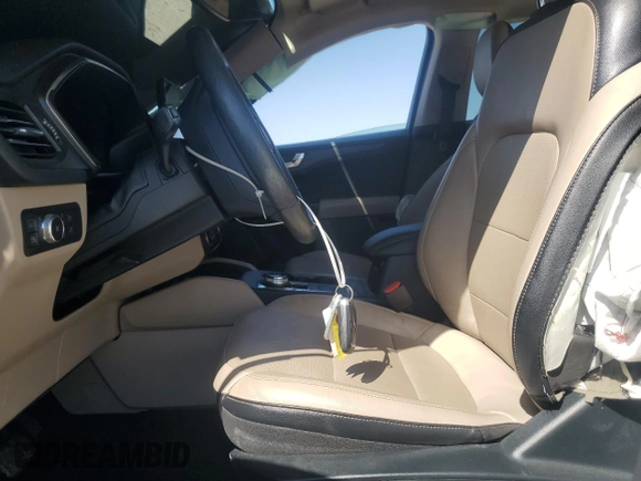 2020 Ford Escape Titanium Hybrid z VIN 1FMCU9DZ6LUC47658, wystawiony jako Copart lot #59599995 z przebiegiem 63 004 mil mil oraz Szkoda całkowita • Salvage title. Historia ofert i sprzedaży dostępna na DreamBid. Obrazek 7.