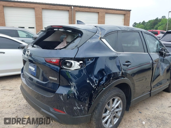 2023 Mazda CX-5 S Carbon Edition z VIN JM3KFBCM6P0251947, wystawiony jako IAAI lot #42286595 z przebiegiem 9 434 mil mil oraz . Historia ofert i sprzedaży dostępna na DreamBid. Obrazek 21.